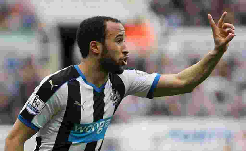Andros Townsend Holding Up Two Fingers